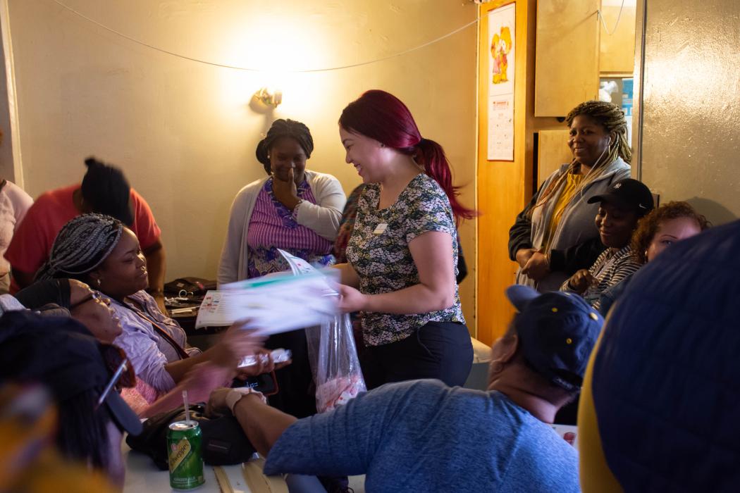 Community health workers such as Rosaura Polanco, center, are a bridge between the communities they serve and formal health systems around the world. Photo by Jessica Turner for IntraHealth International.