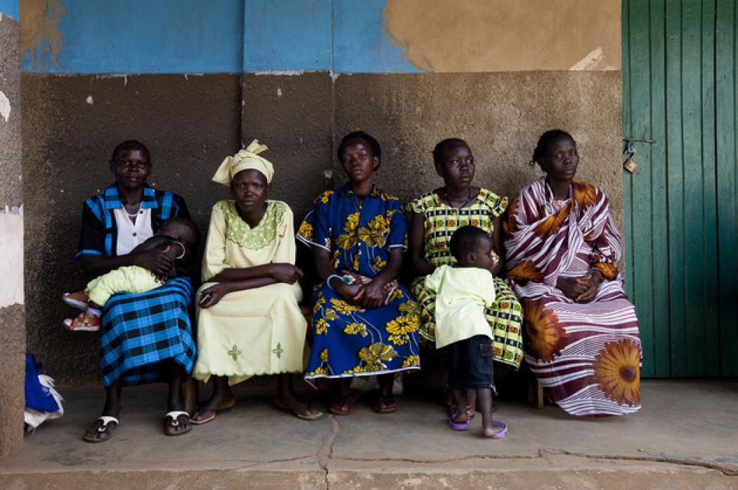 Trevor Snapp for IntraHealth International
Clients wait outside the Saint Bakhita Health Centre in Yei. The health repercussions of losing a highly skilled frontline health worker such as Sister Veronika could affect this community for generations.