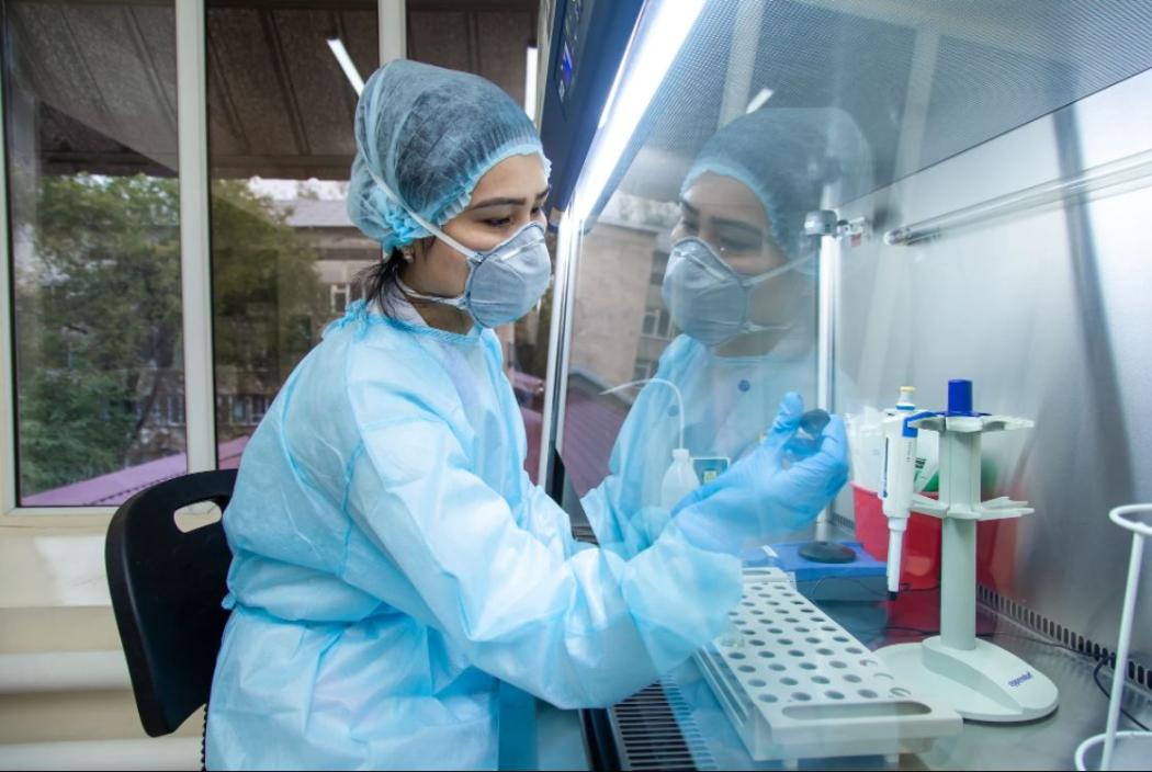 A TB laboratory specialist at the National Reference Laboratory in Kazakhstan performs drug susceptibility testing to ensure physicians prescribe the most effective, appropriate TB treatment for patients. Photo: USAID/Abt Associates