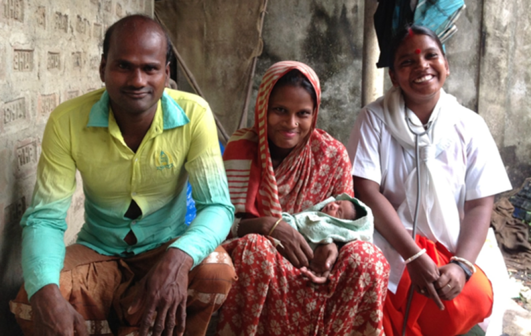 Rohima with her family and baby. Photo courtesy of CARE.