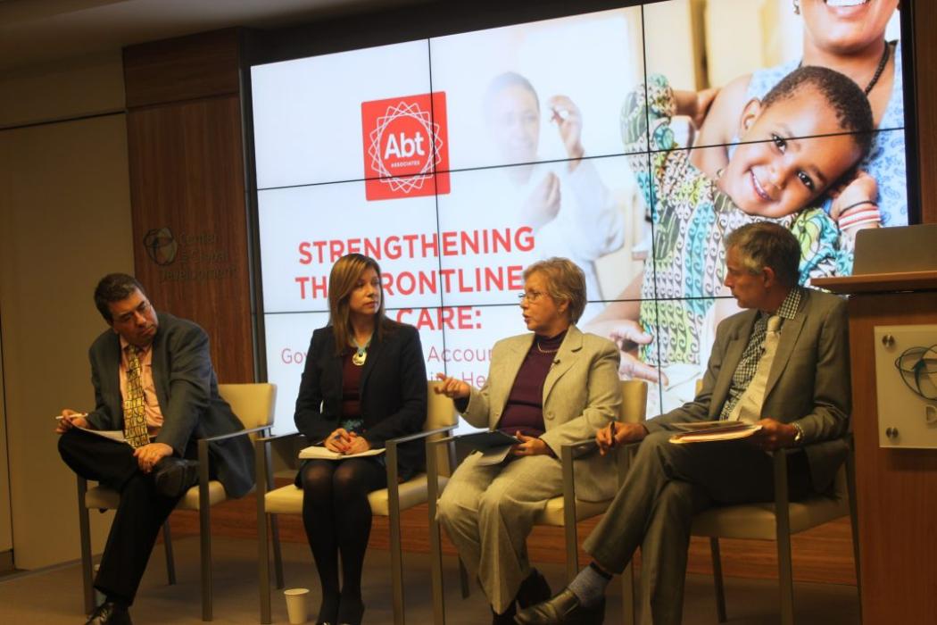 Carolyn Gomes of the Caribbean Vulnerable Communities Coalition makes a point during the Jan. 12 event on governance for community health. Listening, from left, are Eric Sarriot from Save the Children US, Lisa Tarantino from Abt Associates, and event moderator Bob Fryatt, director of the Health Finance and Governance project at Abt Associates. Photo courtesy Stephanie Anyadike, Abt Associates.