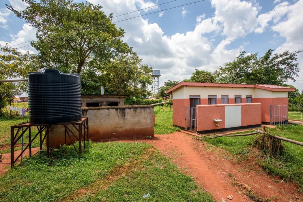 Health clinic latrines and water put in by World Vision at Ntwetwe Health Center IV, next to the old system on the left.
Photo Credit – Jon Warren, World Vision, 2016