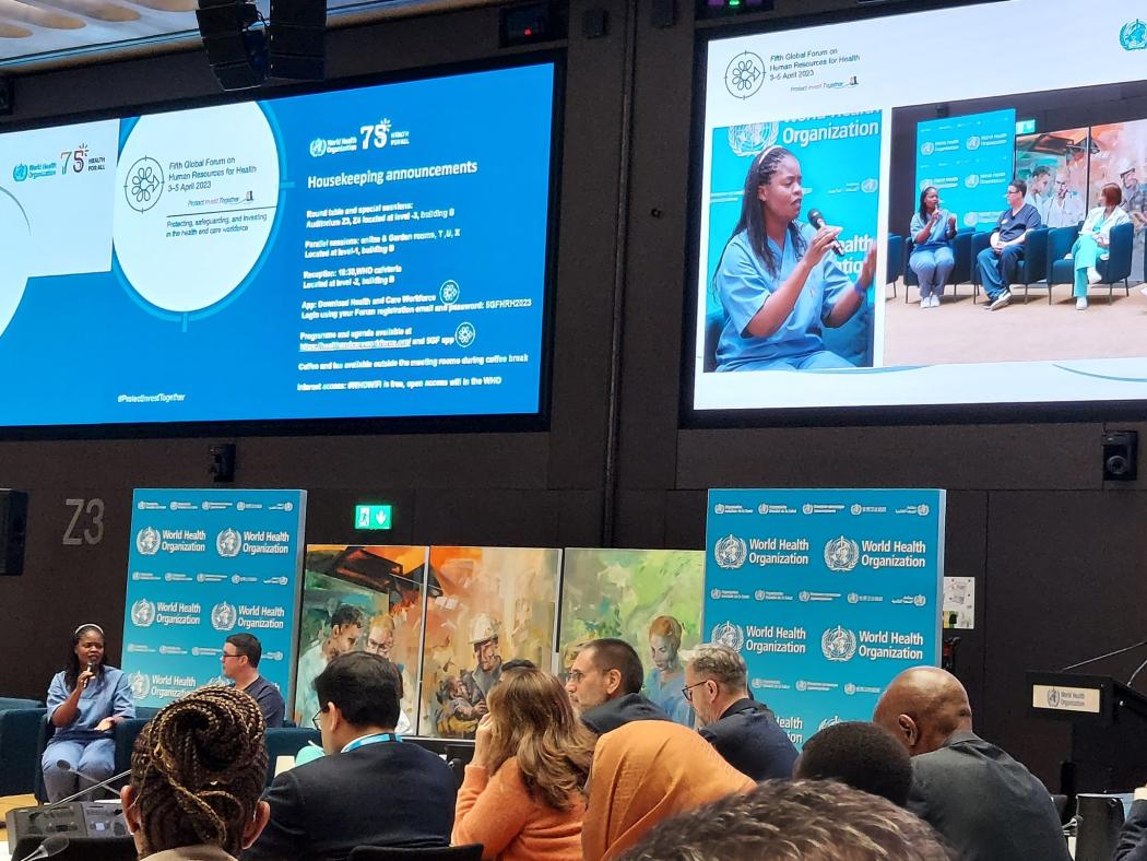 Bridget, a midwife from Zambia, on stage at the Fifth Global Forum on Human Resources for Health. She shares her experience mobilizing community health workers during the Covid-19 pandemic. Photo by Goran Abudlla.