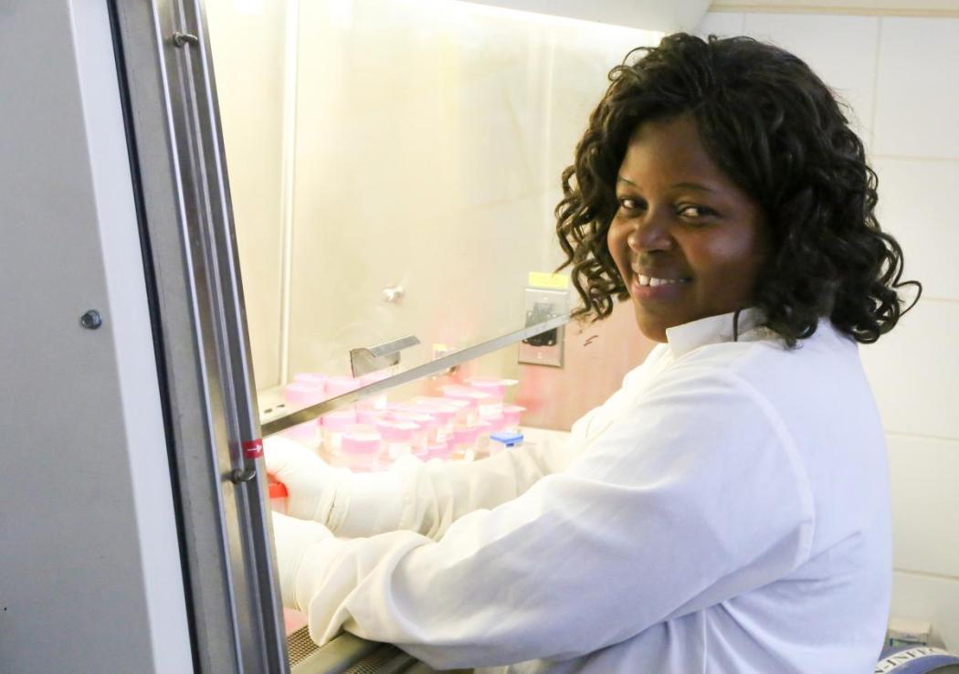 A young lab technician prepares samples for testing at the Bwaila Hospital in Lilongwe, Malawi. Her presence symbolizes the community’s access to health services both now and for the future. Photo credit: Kevin Gandhi/Chemonics, 2017