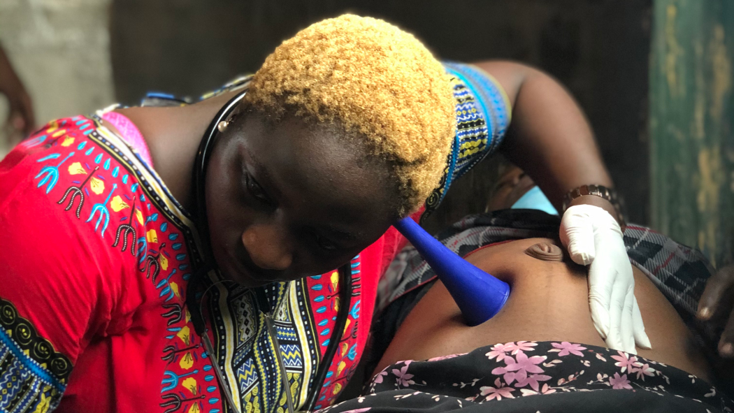 Olajumoke Adebayo provides antenatal care to a pregnant woman. Photo courtesy of Olajumoke Adebayo for IntraHealth International.