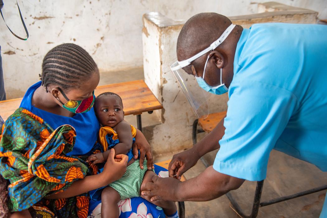 Raphael Salanga, a health surveillance assistant at the Nkhunga Health Centre in Malawi, administers a routine vaccine. Photo: Homeline Media