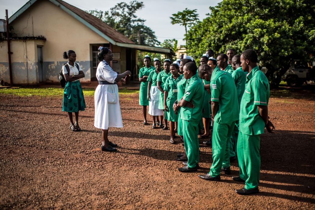 Primary tabs
View(active tab) Edit Revisions Node export
Nursing staff gather at the beginning of the day at the Jinja Regional Referral Hospital in Jinja, Uganda.
Nursing staff gather at the beginning of the day at the Jinja Regional Referral Hospital in Jinja, Uganda. IntraHealth's programs have helped increase funding for human resources for health in Uganda and add thousands of health workers to the workforce. Photo by Tommy Trenchard for IntraHealth International.