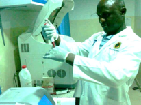 Nigerian Medical Laboratory Scientist Anthony Edika performing a test. Photo Credit: Anthony Edika. 