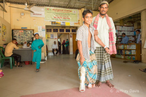 Mohammed Hussein with his dad after the second surgery. Courtesy ReSurge International