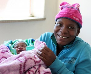 A newborn at Edith Opperman Hospital has a great shot at a long and healthy life thanks to the dedicated nursing staff and prevention of mother-to-child transmission of HIV. Photo by Heather Mason for the Elizabeth Glaser Pediatric AIDS Foundation, 2014. 